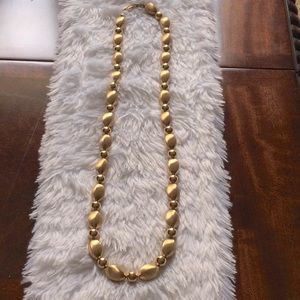 Vintage 1970s gold tone bead type necklace by Napier.